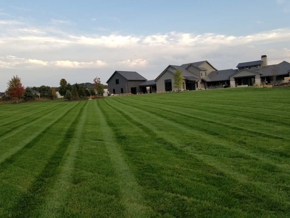 Legendscape lawn crew mowing in Omaha